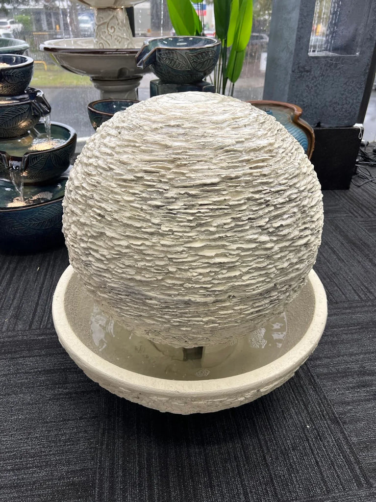 Vesuvio Fountain w/Textured Surface & Round Base. 60x60x61cm. Sand or Black