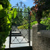 Chara Ornamental Metal Garden Gate w/Posts